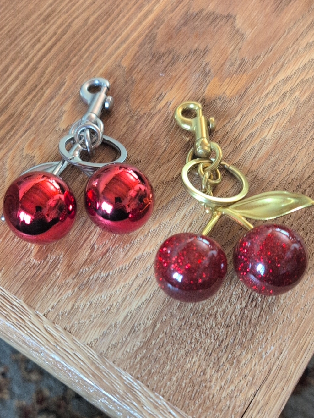 2 Red Cherry Keychain Pair - Gold with Glitter and Silver with Solid Red NWOT